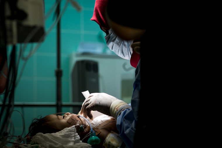 A baby being prepped in the OR